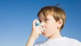 Boy using Inhaler for asthma